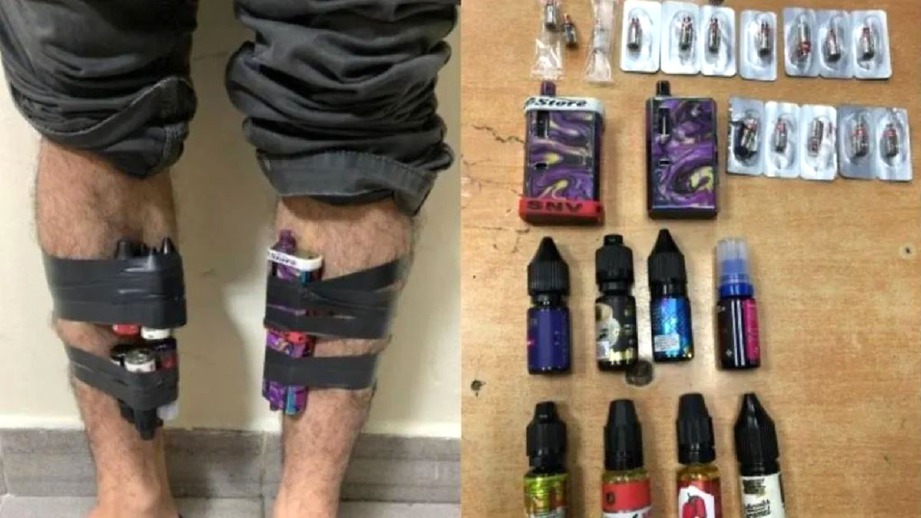 DUA set rokok elektronik dan lapan botol cecair rokok elektronik yang ditemui pada seorang warga Malaysia. FOTO Agensi