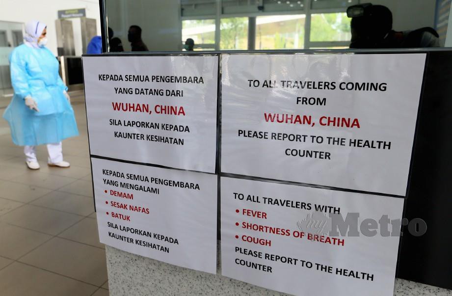 NOTIS kenyataan mengenai wabak Koronavirus (2019-nCoV)  yang diletakkan di pintu masuk Kompleks Kastam, Imigresen, Kuarantin dan Keselamatan (ICQS) Bukit Kayu Hitam. FOTO Amran Hamid