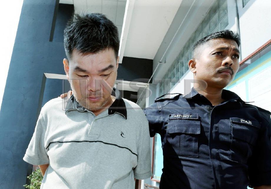 TUKANG masak, Liew Wai Keong, 46, didakwa di Mahkamah Majistret Ipoh atas tuduhan menyebabkan kematian lelaki yang juga suspek tikam jiran di Jalan Theatre pada 2 Februari lalu. FOTO Muhaizan Yahya