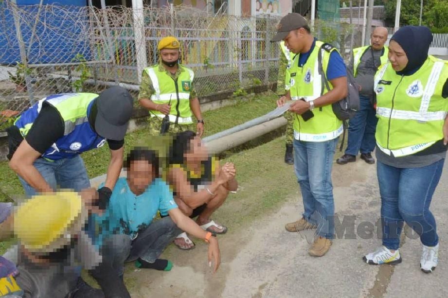 ANGGOTA polis berjaya menahan beberapa pendatang asing tanpa izin (PATI) dalam satau operasi Ops Bersepadu PATI bersama pelbagai agensi lain, di Kota Kinabalu. FOTO Ihsan PDRM
