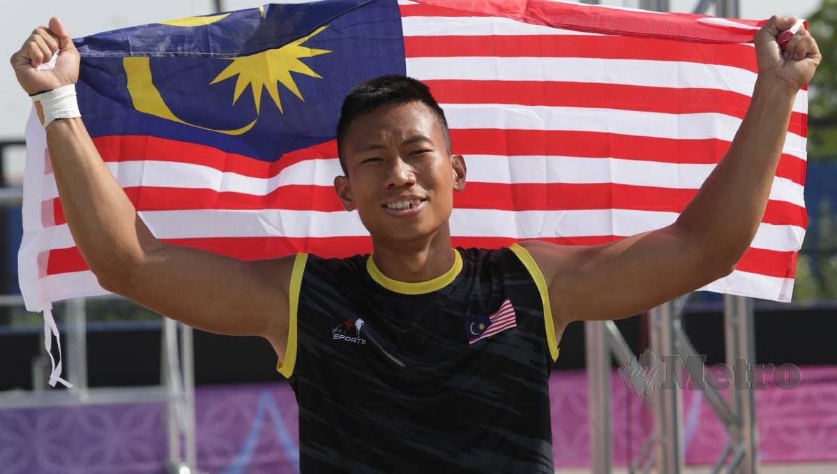 WILLIAM berjaya mengetepikan atlet tuan rumah, Saoheng di penentuan tempat ketiga, keempat acara 100m. FOTO MOHAMAD SHAHRIL BADRI SAALI