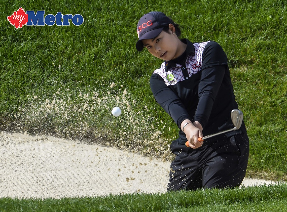 Thailand's Moriya Jutanugarn competes during the Evian Championship women's golf tournament on September 16, 2017 in the French Alps town of Evian-les-Bains. / AFP PHOTO / PHILIPPE DESMAZESPHILIPPE DESMAZES