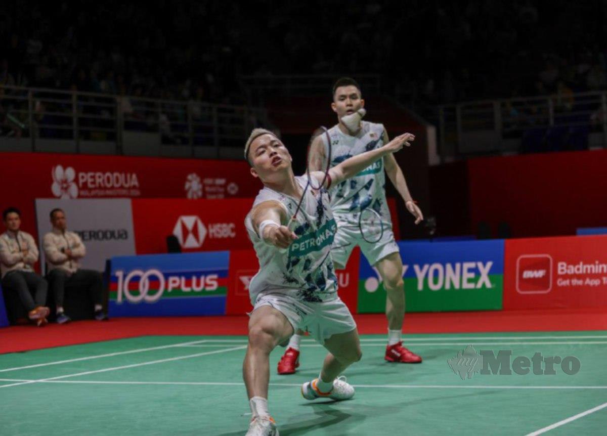AARON-Wooi Yik meraih kemenangan ke atas pemain Korea, Kim Young Hyuk-Wang Chan pada badminton Masters Malaysia di Arena Axiata Bukit Jalil. FOTO ASWADI ALIAS