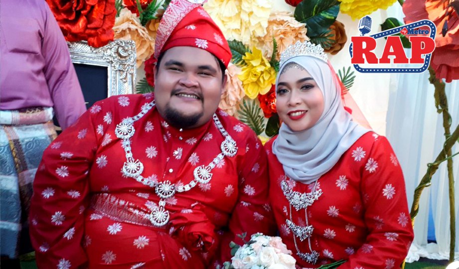 Abam  bersama isterinya Siti Nurhidayah. FOTO NSTP