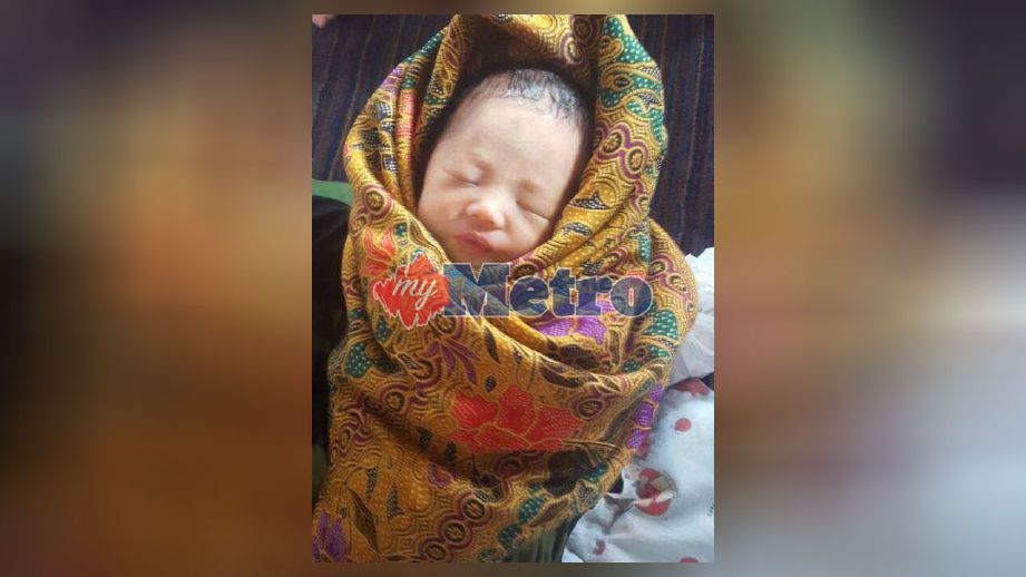 Bayi yang ditemui dalam almari di Kampung Bahagia Jaya. FOTO ihsan polis