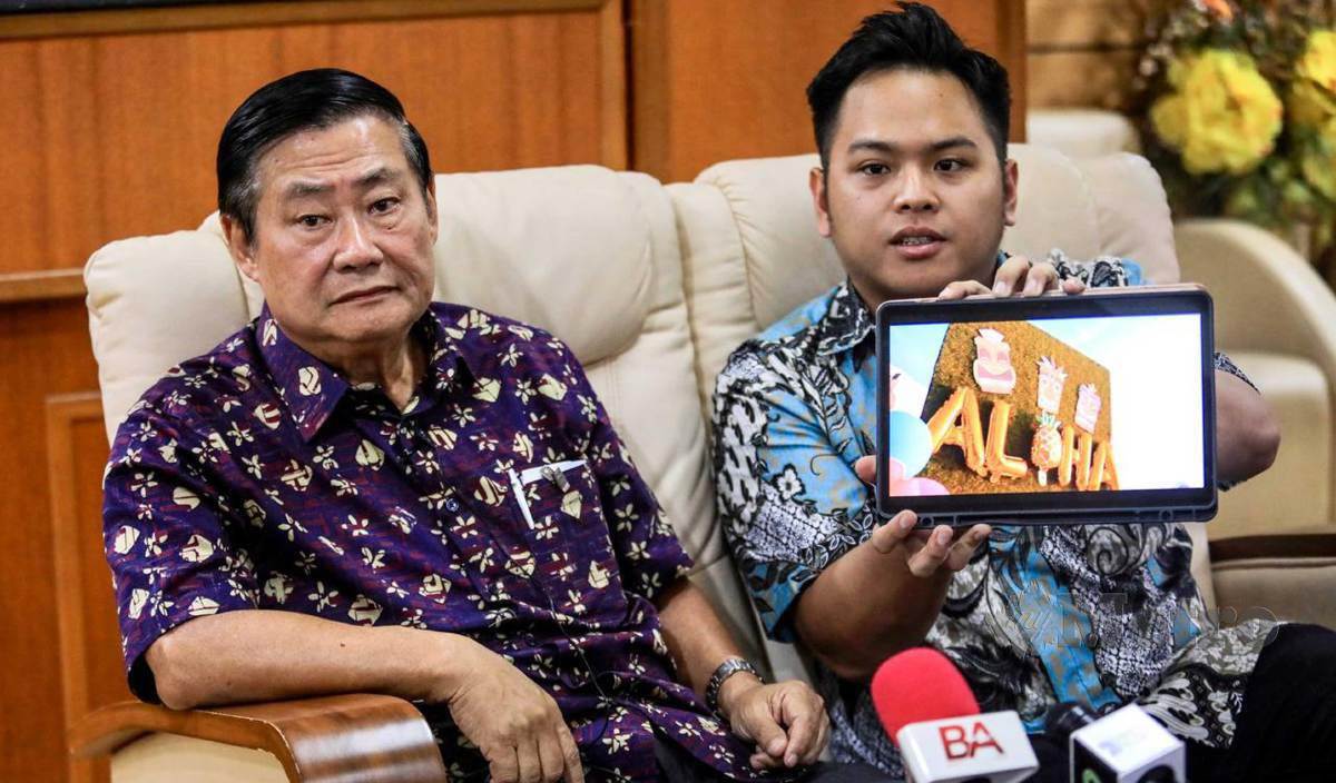 CHONG Fah Ming (kiri) memberi penjelasan berkaitan isu penganjuran parti liar, Aloha Party di Pulau Lang Tengah semasa sidang media di Wisma Darul Iman. FOTO Ghazali Kori
