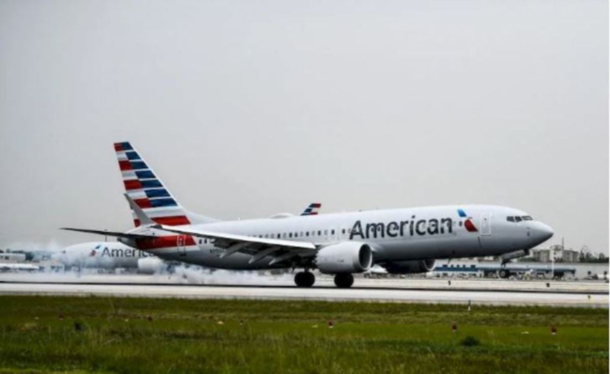 PESAWAT American Airlines. FOTO AFP 
