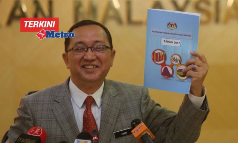 KETUA Pengarah Palajaran, Datuk Dr Amin Senin ketika mengumumkan Pelaporan Pentaksiran Sekolah Rendah 2017 di Putrajaya. FOTO Mohd Fadli Hamzah 