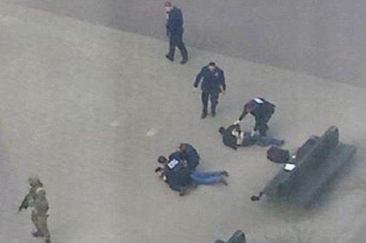 Dua lelaki yang disyaki suspek serangan bom ditahan beberapa jam selepas letupan bom menggegarkan Brussels. - Foto Daily Mail.
