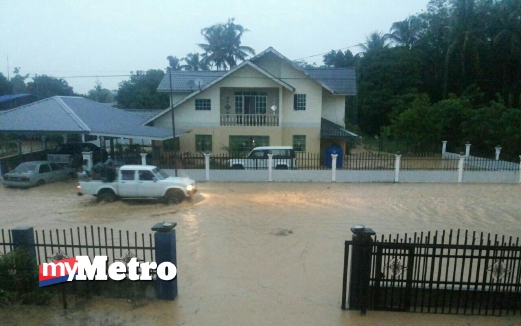 KEADAAN banjir di sekitar Kampung Kauran dan pekan kecil Bingkor di Keningau. FOTO Cleo Will