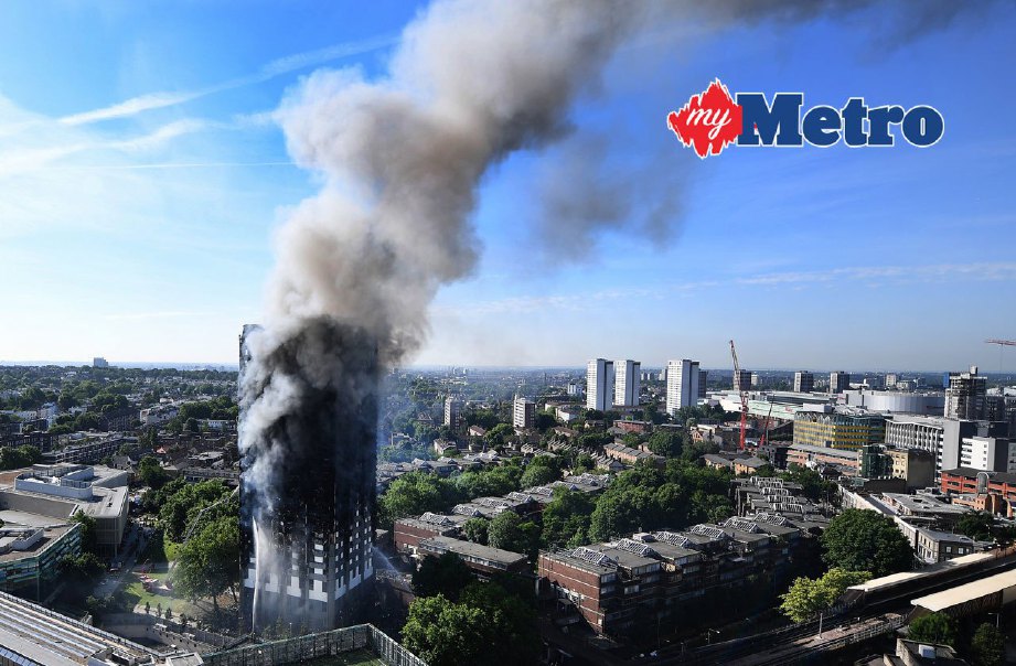 Grenfell Tower, North Kensington, London yang terbakar. FOTO EPA/ANDY RAIN