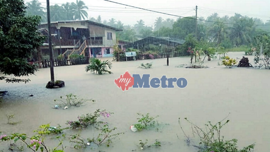 KEADAAN banjir di beberapa kampung di sekitar Kota Marudu. Foto RECQUEAL RAIMI.