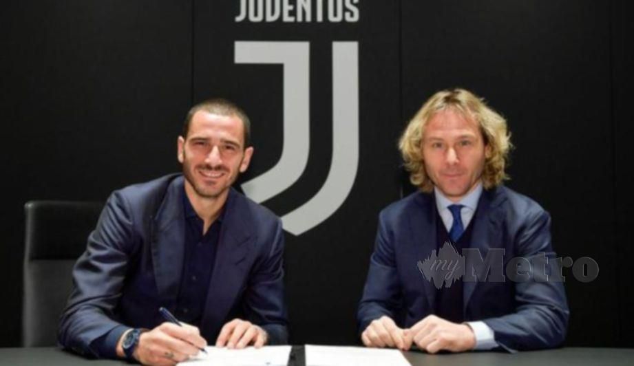 Bonucci (kiri) bersama Naib Pengerusi Juventus, Pavel Nedved. FOTO Agensi