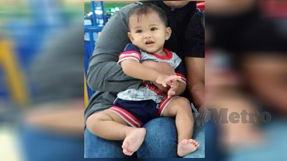 MUHAMMAD Aidil Amsyar, 18 bulan, meninggal dunia dipercayai akibat terjatuh memanjat jeriji tingkap rumah pengasuhnya di Taman Kuala Kangsar. FOTO Ihsan Keluarga