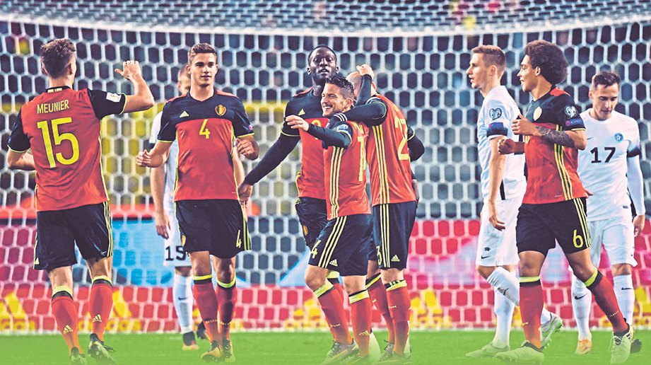 PEMAIN Belgium meraikan kemenangan.