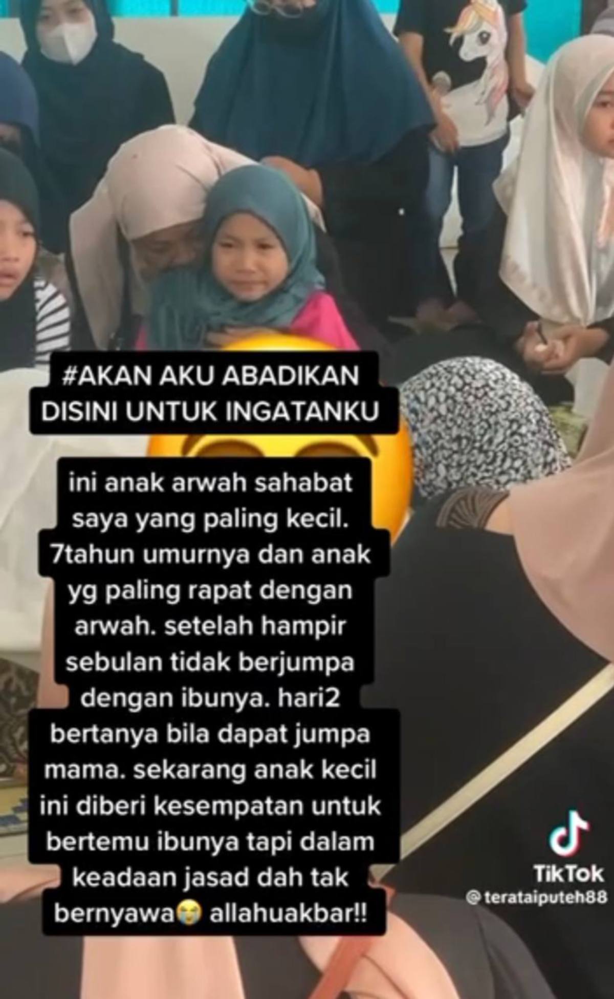 TANGKAP layar video Nur Faiha Arissa  yang menangis ketika berada di sisi jenazah ibunya. FOTO Ihsan Mohd Firdaus Mustaji
