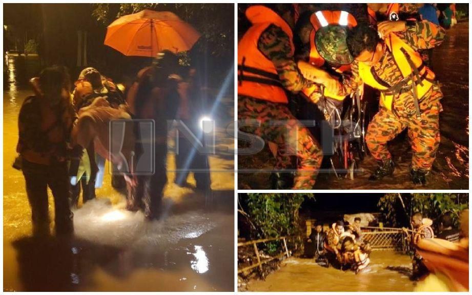 Anggota bomba dan penyelamat memindahkan penduduk Kampung Serting Ulu dan Kampung Geylang berikutan banjir kilat. FOTO Ihsan Bomba