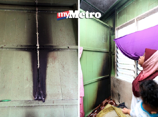 Dinding rumah Rafeah juga terbakar akibat api yang muncul secara tiba-tiba. - Foto ROZAINAH ZAKARIA