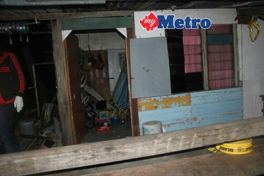 LOKASI kejadian mangsa dipukul di dalam rumah di Kampung Tanjung Aru, Labuan. FOTO ihsan PDRM