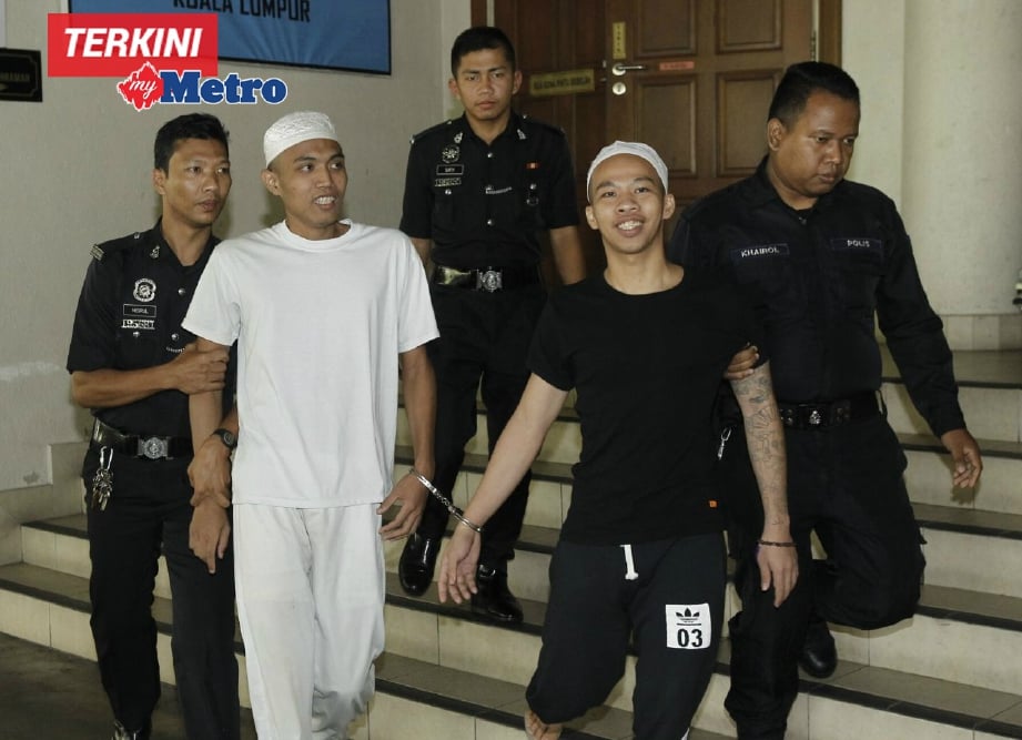 Imam Wahyuddin dan Jonius Ondie (kanan) dihukum penjara 25 tahun selepas mengaku bersalah atas tuduhan mengebom kelab malam Movida. FOTO Aizuddin Saad 