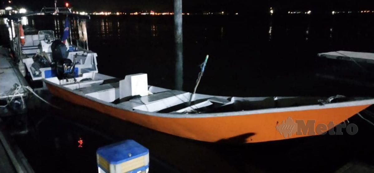 BOT dinaiki pemancing yang terbabit dalam kejadian pelanggaran di Selat Dinding malam tadi. FOTO ihsan bomba