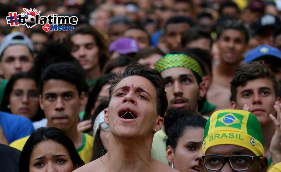 REAKSI penyokong Brazil ketika wisel penamat ditiupkan. -Foto Reuters