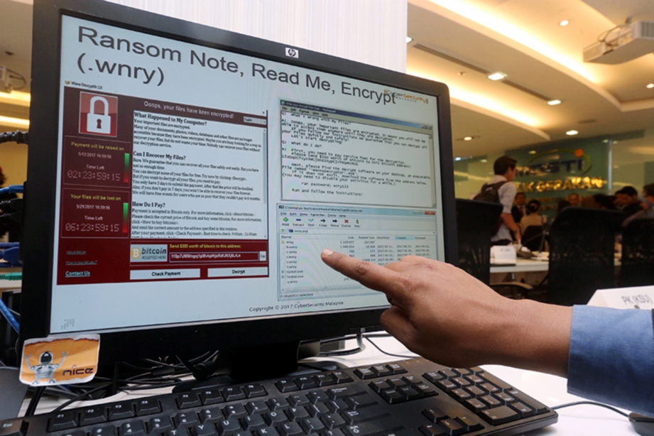 SAMPEL dipaparan skrin komputer yang terkena serangan Ransomeware. FOTO Mohd Fadli Hamzah