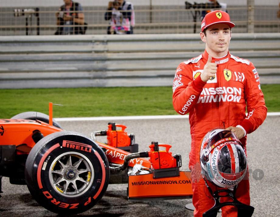 REAKSI Leclerc selepas memenangi petak utama GP Bahrain di Litar Sakhir, awal pagi tadi. — FOTO EPA