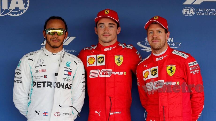 Hamilton (kiri) bersama Leclerc (tengah) dan Vettel. FOTO REUTERS 