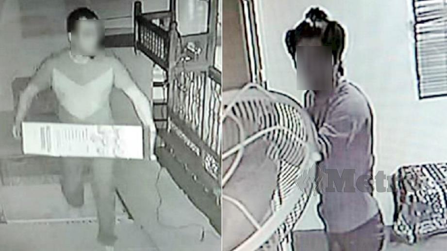 RAKAMAN CCTV menunjukkan dua lelaki memecah dan mencuri duit tabung masjid. FOTO Ihsan Pembaca