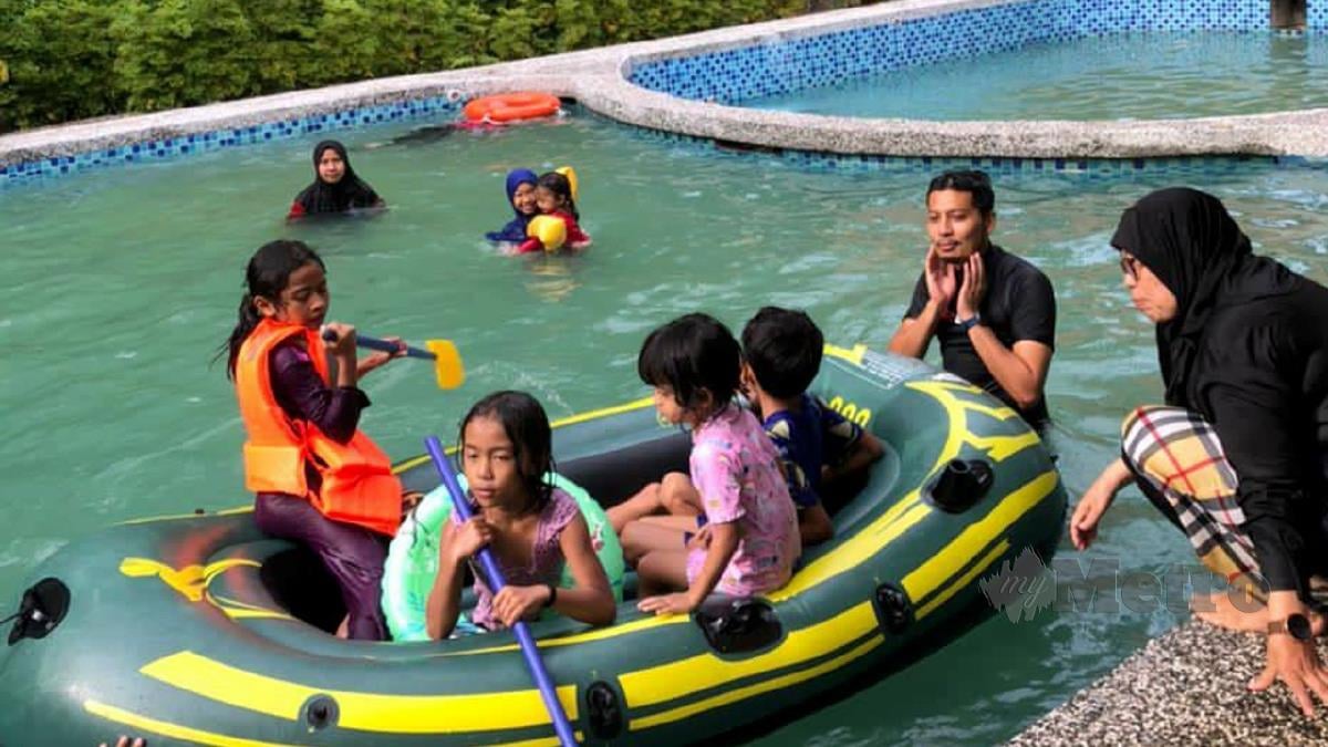 AMANI dan keluarganya yang bercuti di Teduhan Langat, Ulu Selangor