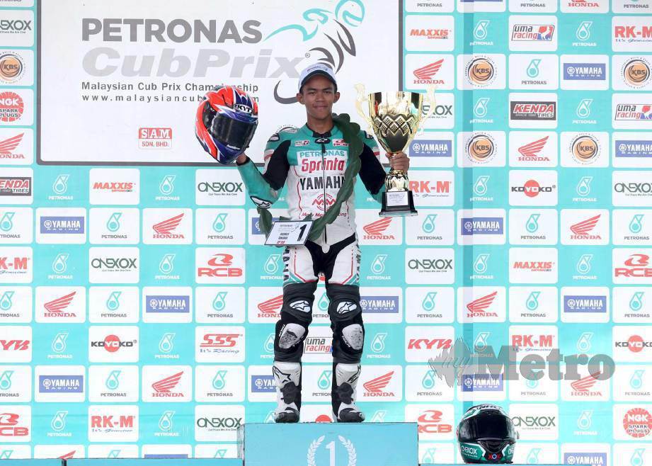 MD Haziq  juara kategori CP150 Pusingan 8 Kejuaraan Cub Prix Malaysia Petronas di Litar Lumba Tangkak. FOTO Adi Safri