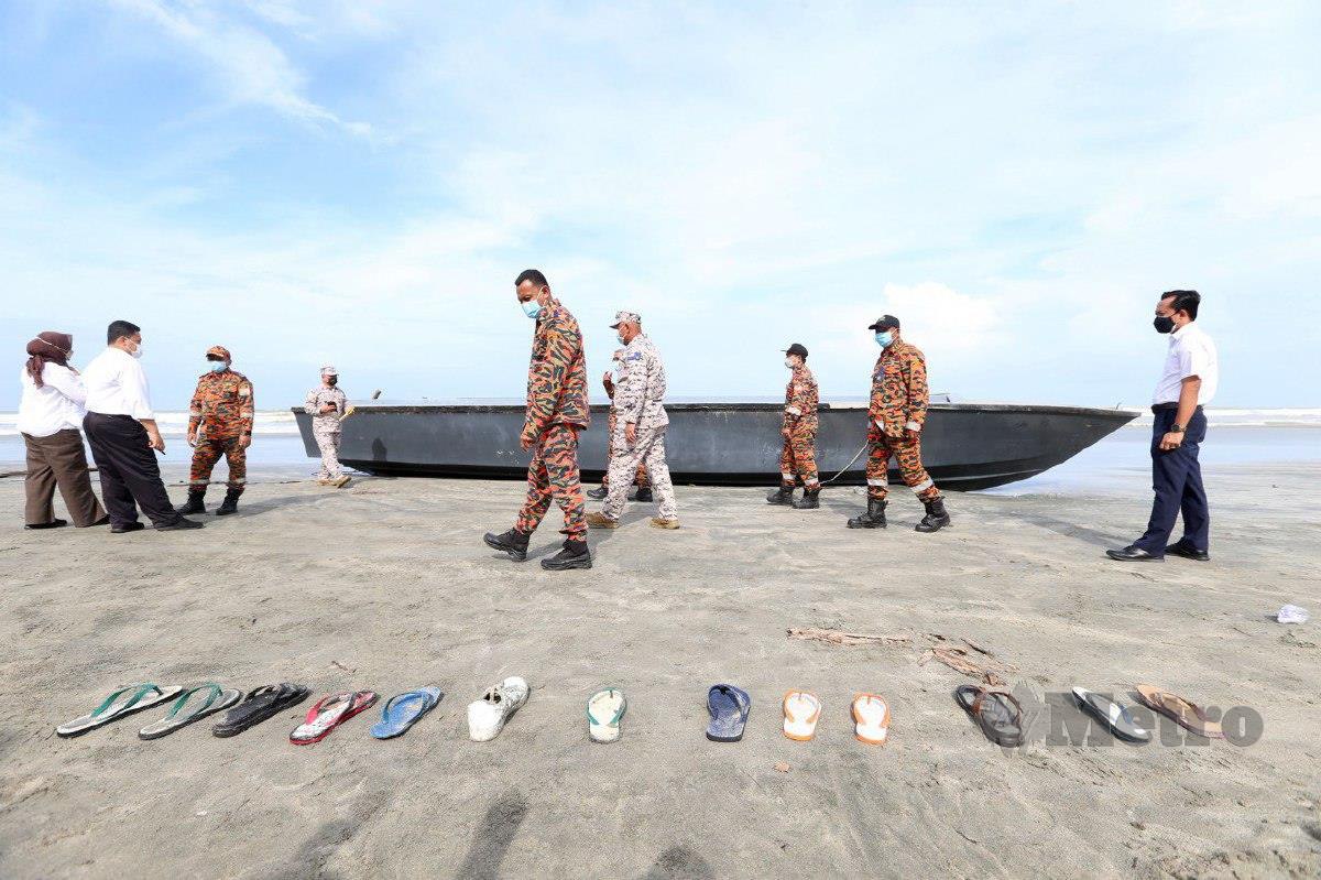 KASUT dan selipar milik Pati yang dijumpai di perairan Tanjung Balau. FOTO Nur Aisyah Mazalan