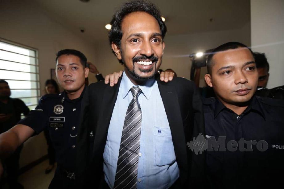 TERTUDUH dihadapkan ke Mahkamah Sesyen Shah Alam atas tuduhan menipu. FOTO Roslin Mat Tahir  