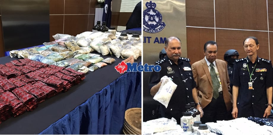 Pengarah JSJN Bukit Aman, Datuk Seri Mohd Mokhtar Mohd Shariff menunjukkan dadah dan barangan lain yang dirampas. - Foto RABI 'ATUL 'ADAWIYAH ISMAIL