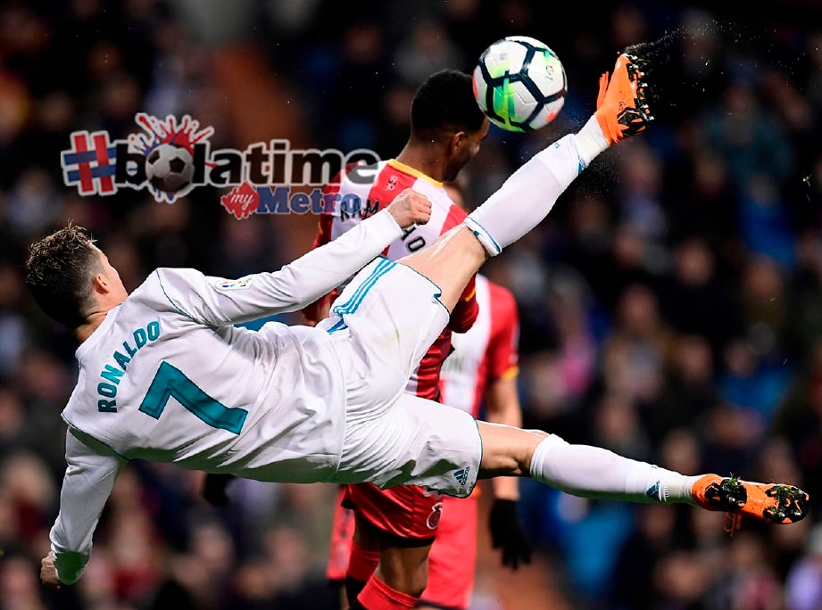 AKSI Ronaldo ketika menentang Girona. -Foto AFP