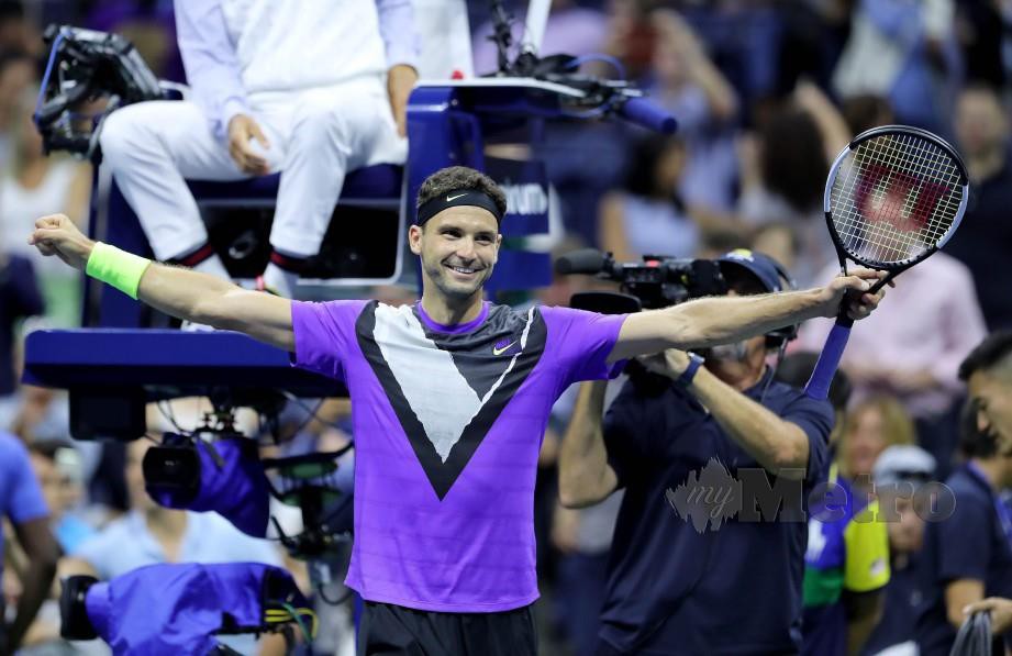 REAKSI Dimitrov selepas menewaskan Federer pada suku akhir perseorangan lelaki Terbuka AS, pagi tadi. — FOTO AFP