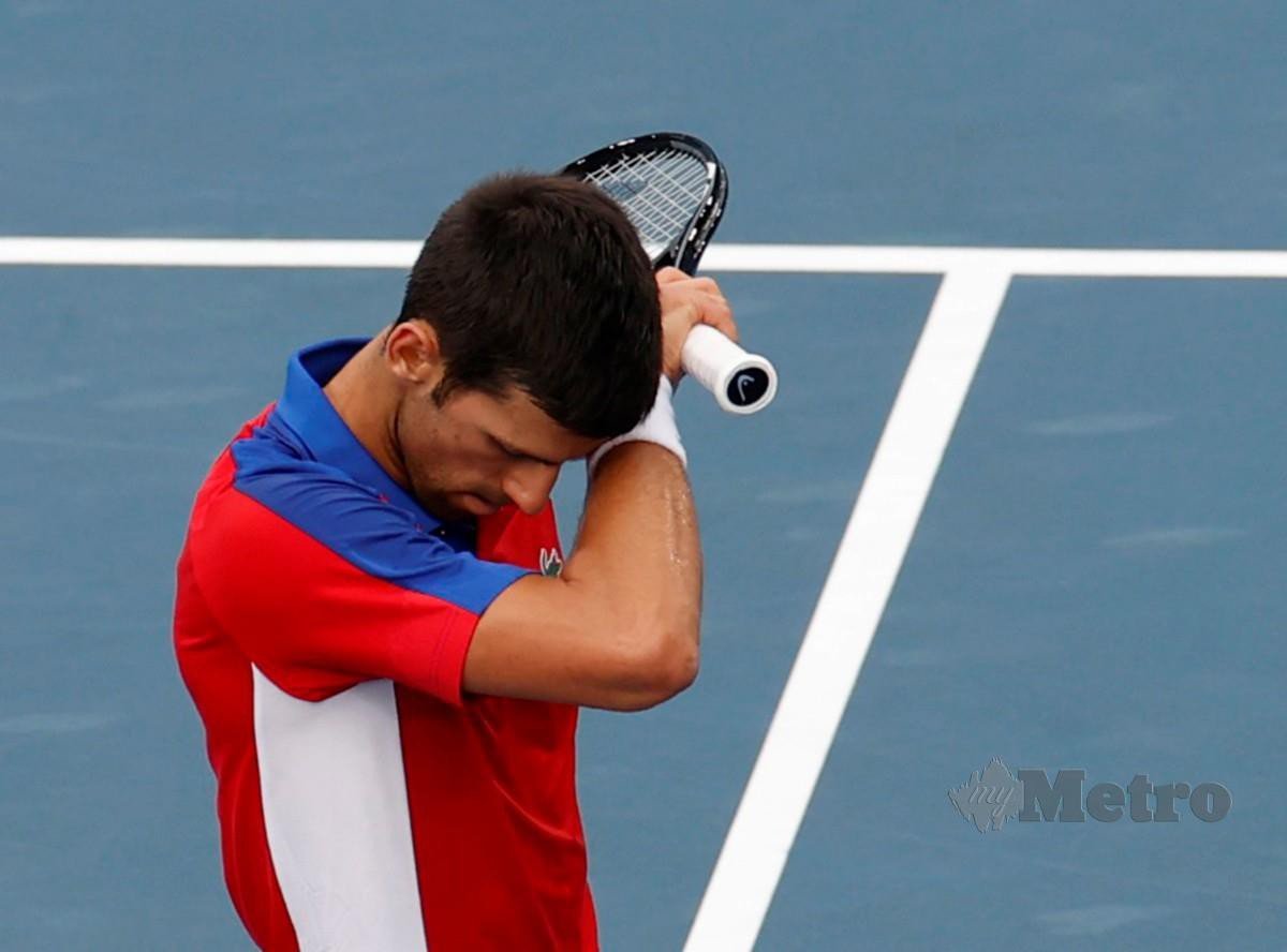 REAKSI kecewa Djokovic. FOTO EPA