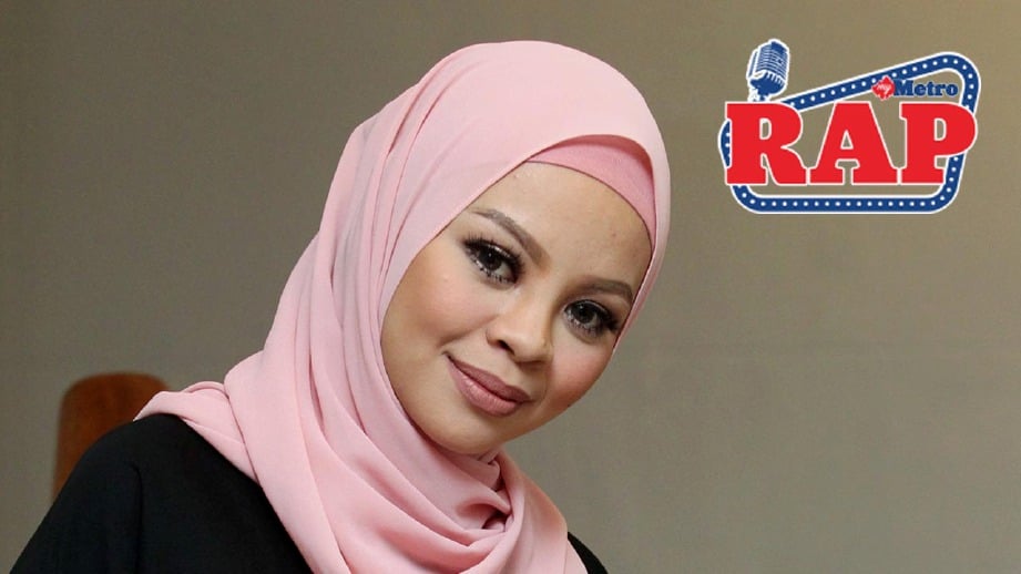 Siti Sarah gembira dapat lagu ditunggu selama ini. FOTO MAHZIR MAT ISA