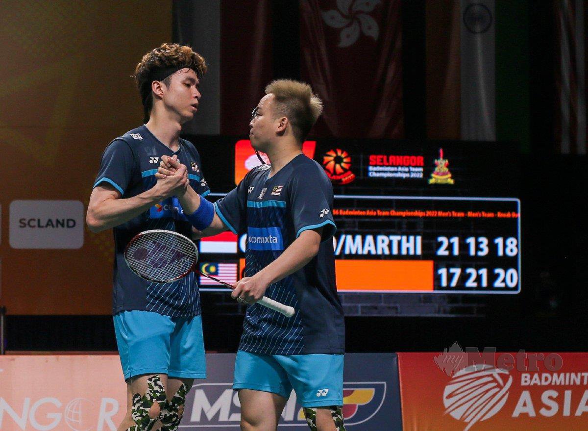 AKSI Aaron (kanan) dan Wooi Yik pada Kejohanan Badminton Berpasukan Asia (BATC) 2022, baru-baru ini. FOTO Aswadi Alias