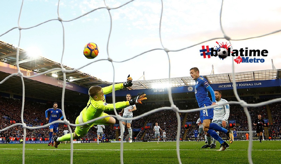 VARDY (kanan) menjaringkan gol untuk Leicester. FOTO/AFP 
