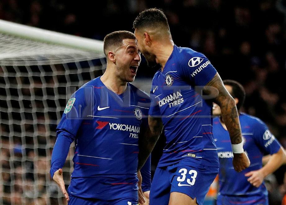 HAZARD meraikan jaringannya bersama rakan sepasukan. -Foto Reuters