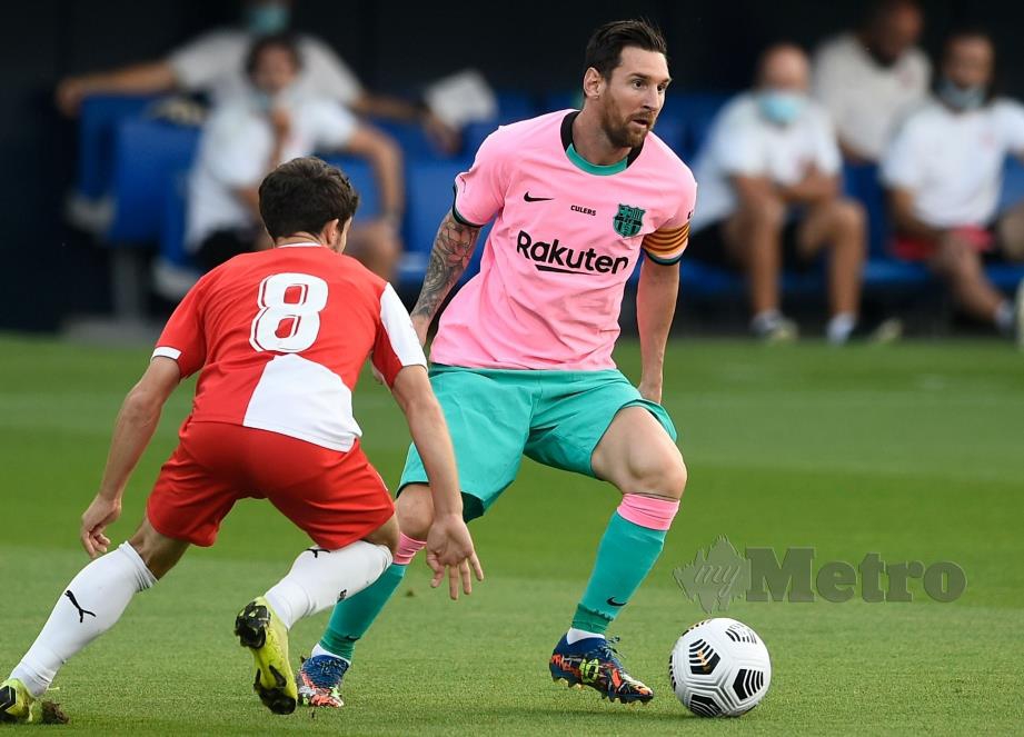 Lionel Messi beraksi dalam musim ke-17 di Barcelona. FOTO AFP