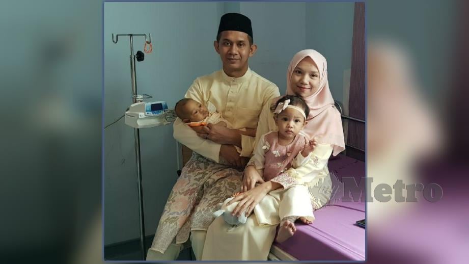Muhammad Nassar bersama isteri dan dua anak mereka di hospital. FOTO Ihsan Muhammad Nassar Sanusi  