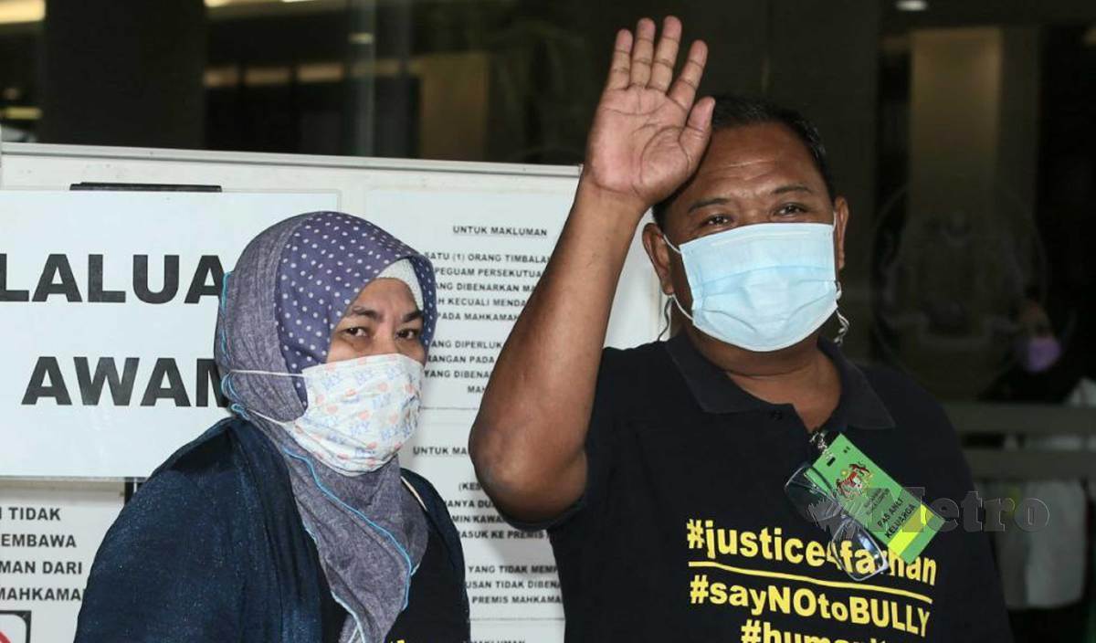 ZULKARNAIN Idros (kanan) dan Hawa Osman tiba di Kompleks Mahkamah Kuala Lumpur pagi ini. FOTO Eizairi Shamsudin