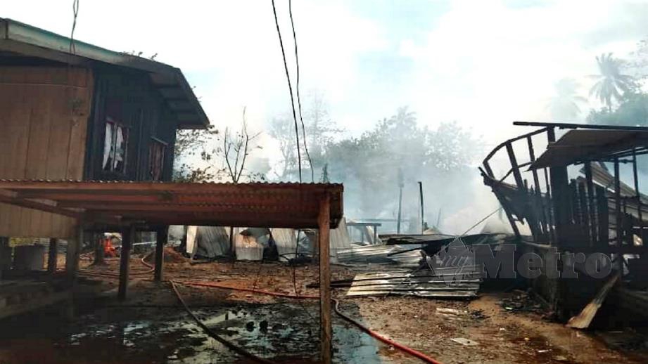 Kebakaran membabitkan enam buah rumah yang dihuni 20 penduduk di Kampung Tondig, Tandek, Kota Marudu. FOTO Recqueal Raimi