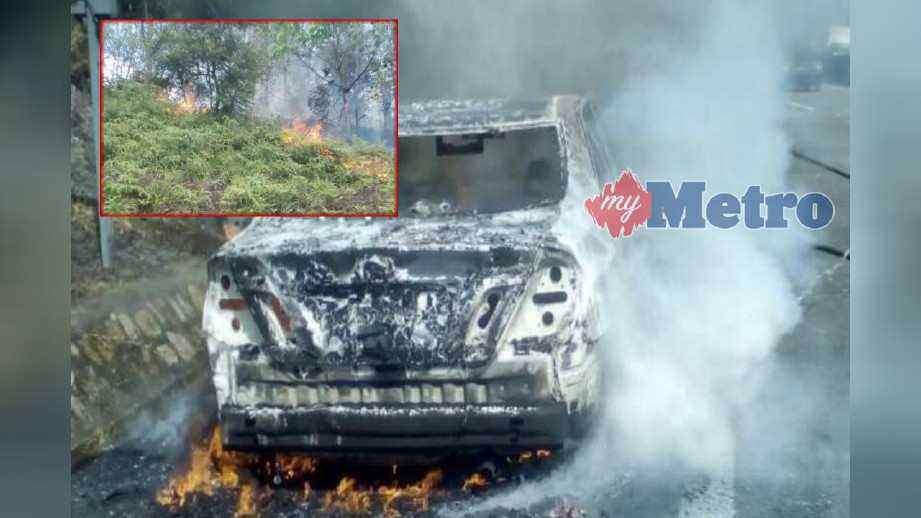 KEADAAN kereta yang terbakar sehingga mengakibatkan api merebak ke bahagian bukit di tepi lebuh raya. FOTO Ihsan JBPM