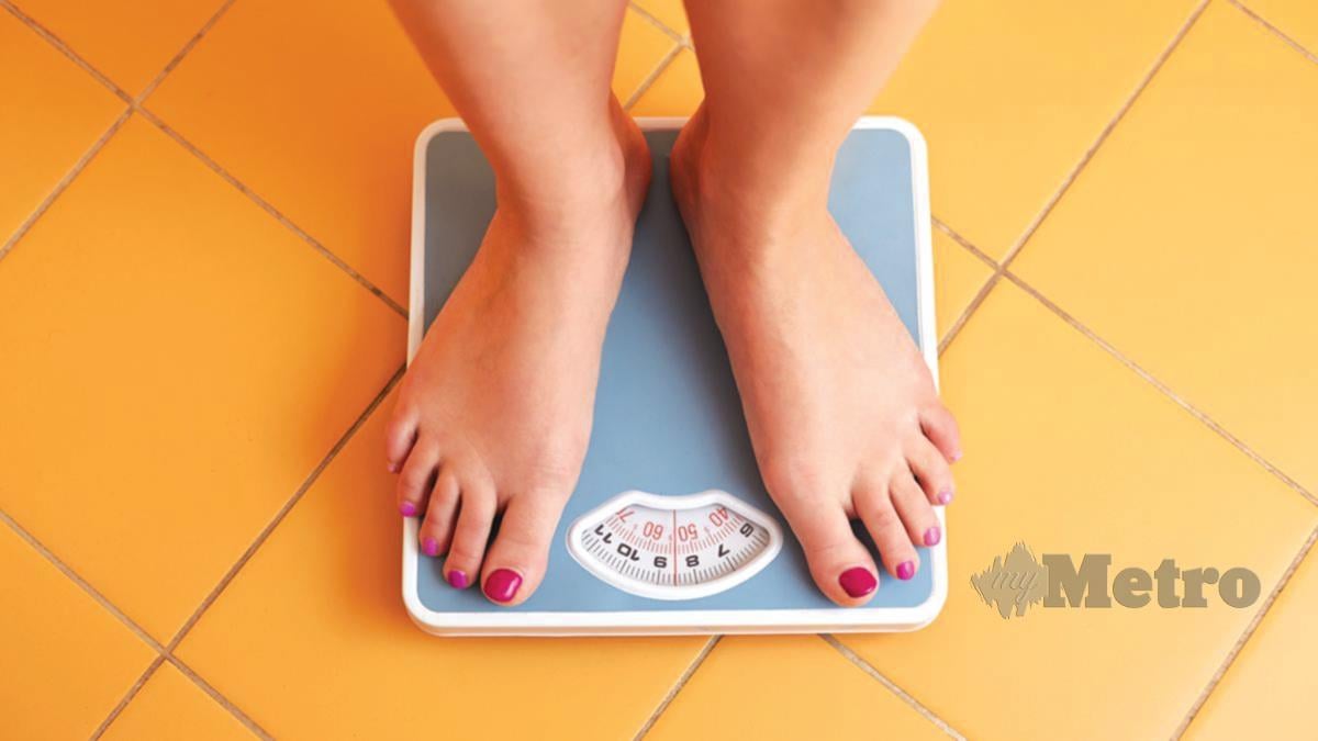 KURANGKAN berat badan dapat elak penyakit kronik. 