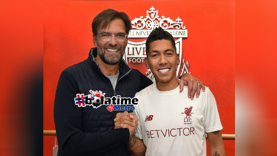 ROBERTO Firmino ceria bersama pengendali Liverpool, Jurgen Klopp selepas menandatangani kontrak baru jangka panjang dengan The Reds, hari ini. FOTO Liverpool FC