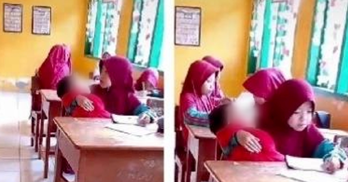 Murid perempuan terpaksa gendong adik dalam kelas